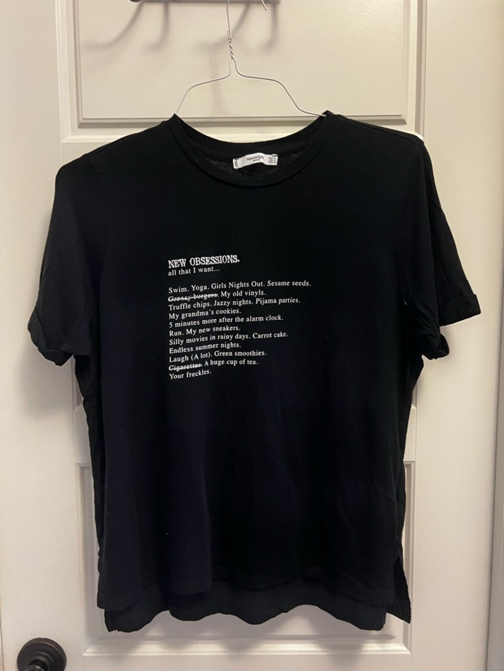Mango Black Tee with White 'New Obsessions' Text